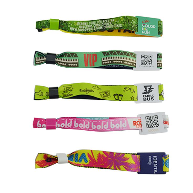 four lanyards with different designs and colors are shown in this image, one has a name tag on it