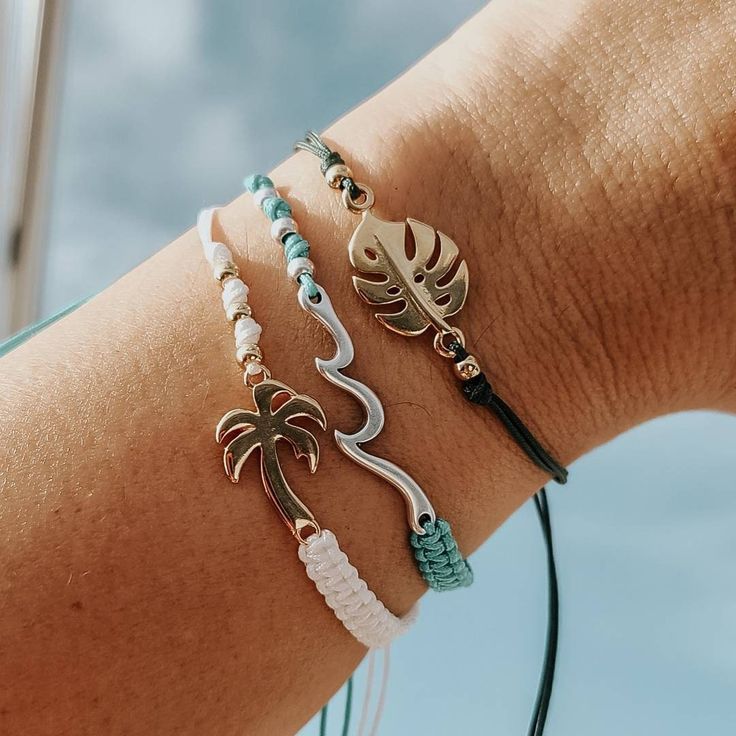 Adjustable Colorful Beach Bracelets with a cute Charm for that summer look. Super Dainty and great for stacking or creating that unique surfer girl beach look.. Perfect as a gift to yourself or for that special beach person in your life! Pair it with our unique shark bracelets! Choose: ♡ Nylon Bronze with Silver Wave - Lead and Nickle Free ♡ Nylon Teal with Silver Wave - Lead and Nickle Free ♡ Nylon White with Gold Palm Tree - 24K plated ♡ Nylon Green with Gold Monstera Leaf - 24K plated ♡ Closu Adjustable Bracelets For Beach In Summer, Adjustable Summer Beach Bracelet, Adjustable Length Bracelet For Summer Beach, White Adjustable Friendship Bracelets For Beach, Minimalist Handmade Bracelets For Beach, Adjustable Jewelry For Beach Vacation, Adjustable Braided Bracelets For Beach Vacation, Adjustable Summer Jewelry Gift, Casual Strand Jewelry For Beach Party