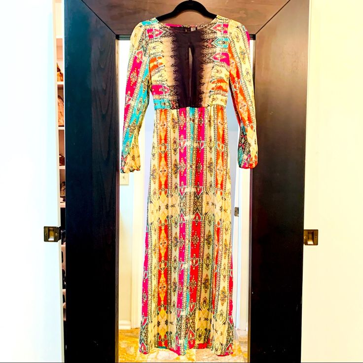 This Timeless Multi-Colored Dress Is So Versatile; Vintage, Boho Chic, Dressy, Casual Or Wear With Denim Jacket. The Size Is Xs-S Bc It Has Elastic Waist. It Has The Perfect Flow For A Long Dress And Is Super Comfortable. It’s Very “Johnny Was” Style But Got In A Boutique In S. Beach. Bohemian Midi Dress With Vibrant Print For Party, Colorful Pattern Long Sleeve Party Dress, Colorful Patterned Long Sleeve Party Dress, Colorful Long Sleeve Party Dress, Colorful Spring Festival Maxi Dress, Multicolor Print Long Sleeve Dress For Festival, Pink Long Sleeve Maxi Dress With Vibrant Print, Long Sleeve Multicolor Print Dresses For Festival, Spring Boho Maxi Dress In Multicolor