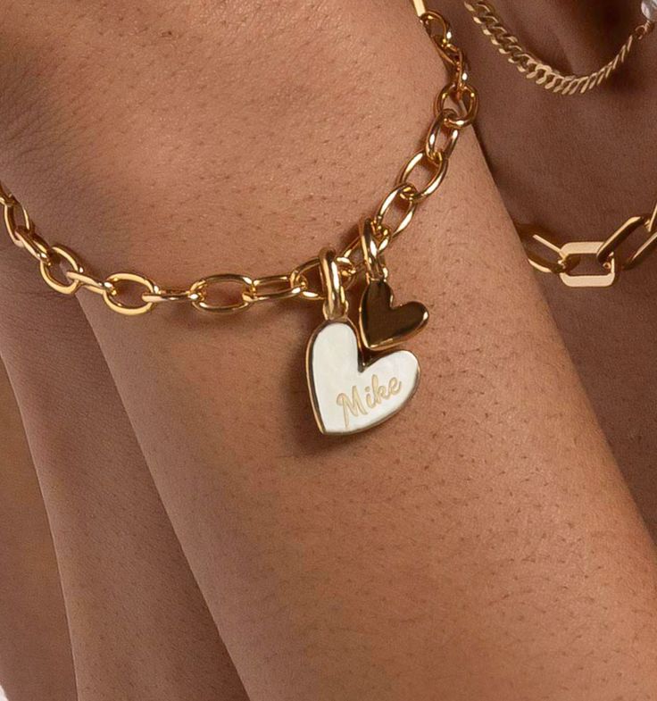 The most beautiful heart charms. This heart bracelet comes with one of our most loved chains. Option to personalize both the bigger heart charm and also the smaller heart charm with an initial. You can also add additional heart charms onto this bracelet.

Size: 25mm, 12mm Heart Shaped Ring, Heart Charm Necklace, Double Heart Necklace, Sunflower Necklace, Heart Shaped Jewelry, Heart Shaped Necklace, Earring Trends, Heart Shaped Rings, Gold Charm Bracelet