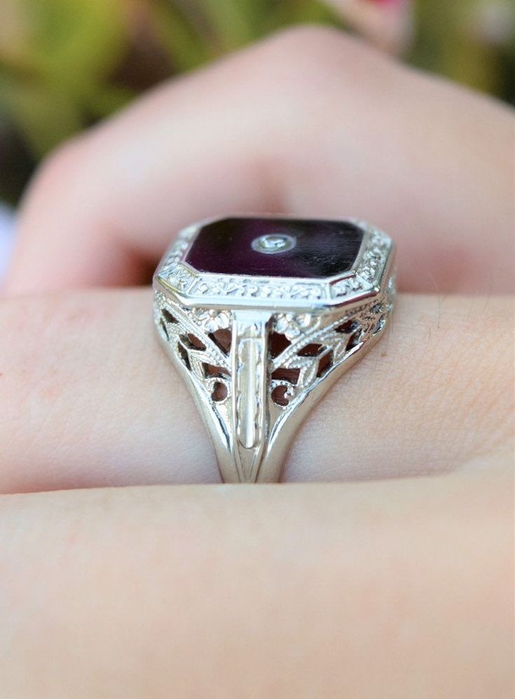 Check shop announcements! www.etsy.com/shop/MyMenagerieVintage Follow us on instagram @my_menagerie_vintage or #mymenagerievintage Beautifully-detailed 10k white gold black stone ring. Fabulous filigree setting. This black stone has a slightly different look than my onyx rings. It also tests as slightly less hard. I am not sure if this is jet or obsidian. The clear stone tests just under diamond at white sapphire. Marked 10k JEWEL EMBLEM Size 5 - 5.25 Clear stone: 2mm Weight: 3.8g Condition: Goo Onyx Rings, Black Stone Ring, Vintage Fine Jewelry, 1920s Art, Ladies Ring, 1920s Art Deco, Black Onyx Ring, Clear Stone, Onyx Ring