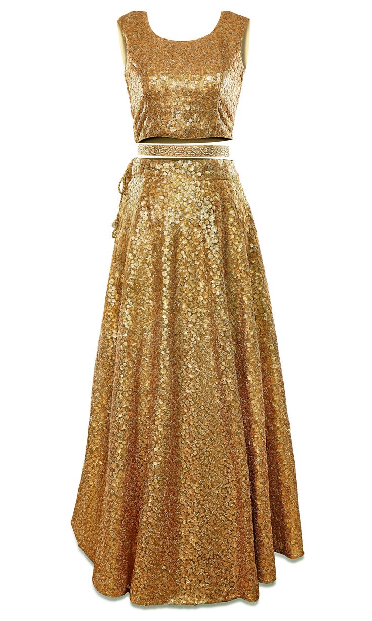 This GORGEOUS lehenga is all hands on deck! This 3-piece gold lehenga is covered in glittering gold embroidery and comes with a stunning pale pink dupatta with pearls and gold stones around the border. *belt available upon request.