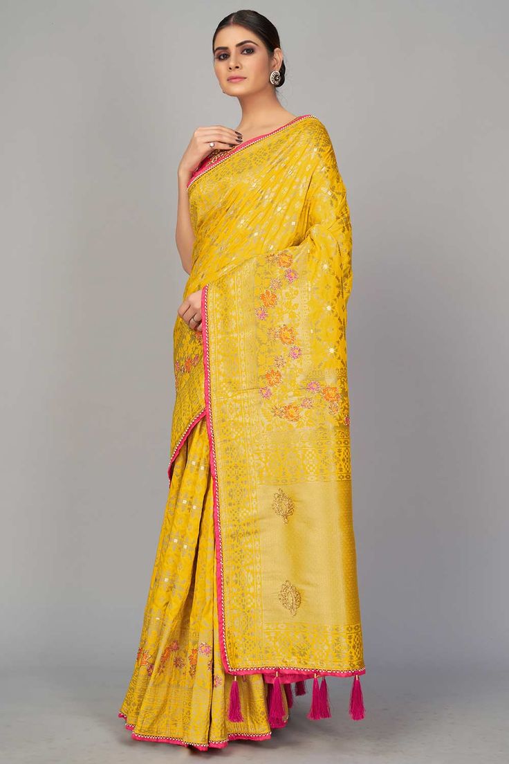 Monjolika fashion presents look simple and sober in festive event and function with this stunning yellow color designer saree. This party wear pure viscose dola silk saree is decorated with fancy woven embroidery work. The saree comes along with matching rani pink color banarasi dupion silk heavy work unstitched blouse piece that can be custom tailored upto 42 inches. Product Features: Saree Color: Yellow Blouse Color: Magenta Saree Fabric: Art Silk Blouse Fabric: Art Silk Saree Work: Woven Blou Magenta Saree, Pre Stitched Saree, Woven Embroidery, Dola Silk Saree, Saree Work, Stitched Saree, Rani Pink, Heavy Work, Readymade Saree