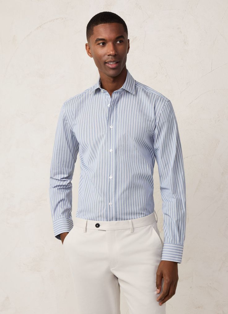 - Shirt in 100% cotton twill. - Regular fit.  - Long sleeves.  - Italian collar.  - Two-tone check print.  - Pleat in the centre back.  - Rounded two-button cuff.  - Hanging loop on the back. Vertical Stripes Button-up Business Casual Shirt, Vertical Stripes Button-up Shirt For Business Casual, Business Casual Button-up Shirt With Vertical Stripes, Business Casual Vertical Stripes Button-up Shirt, Striped Button-up Shirt For Business Casual, Business Pinstripe Shirt With Button Closure, Business Casual Button-up Shirt With Striped Collar, Fitted Pinstripe Shirt For Business Casual, Business Casual Shirt With Striped Collar