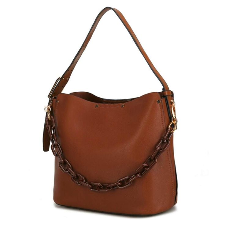 This Chain Vegan Leather Hobo Bag is the perfect everyday companion. Crafted from pebble vegan leather, this bag is both stylish and ethical. With a roomy interior, you can fit all of your daily essentials. The magnetic snap fastening ensures your items stay secure and a long adjustable strap allows for comfortable carrying. Pebble Vegan Leather Magnetic snap fastening Interior wall zip pocket + two slip pockets Measurements: 15” W x 10” H x 5” D Adjustable Shoulder strap: 6”-11” Hobo Shoulder Bag, Simply Chic, Pretty Bags, Leather Hobo Bag, Hobo Handbags, Leather Hobo, Hobo Bag, Rebecca Minkoff Hobo, Bag Sale