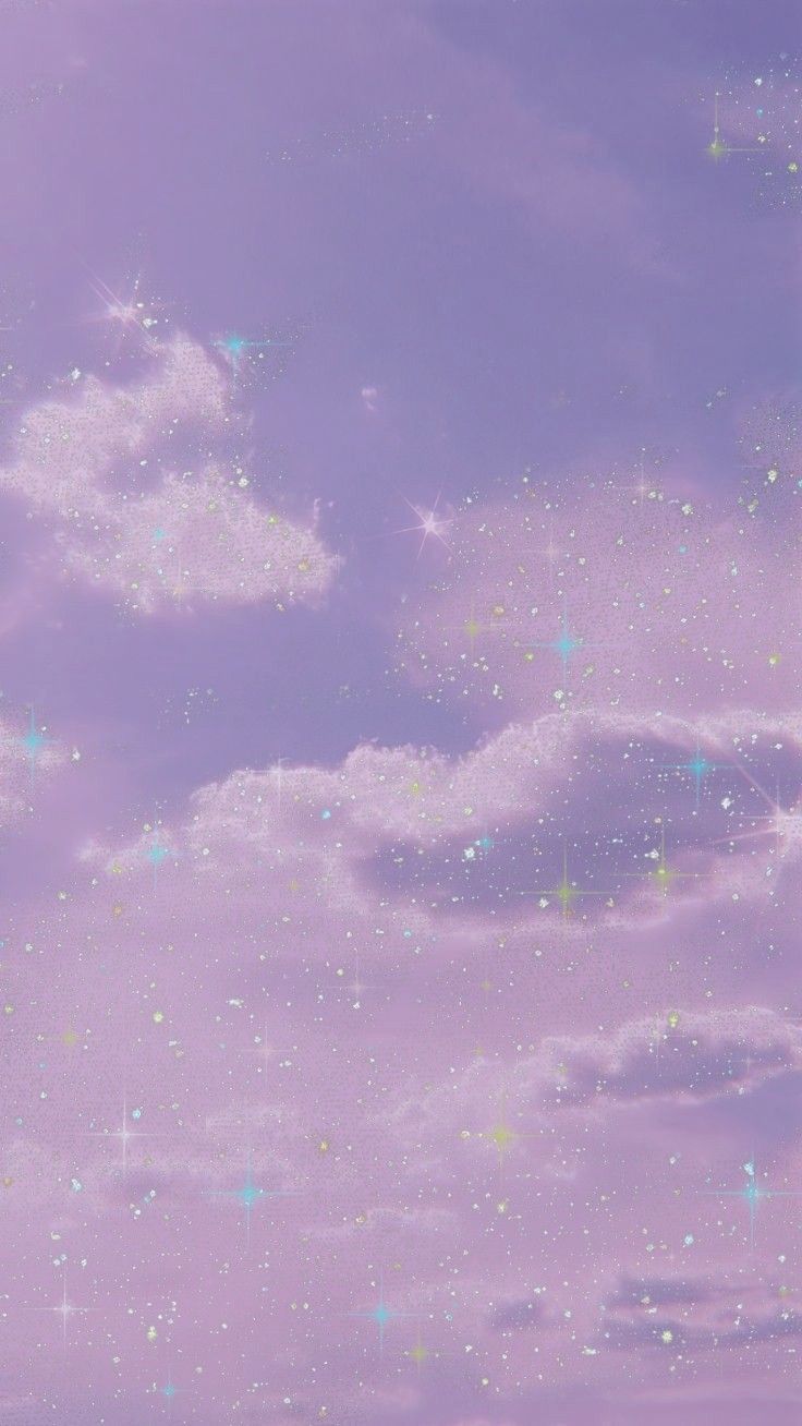 the sky is filled with stars and clouds