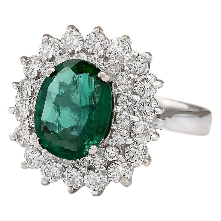 Stamped: 14K White Gold Total Ring Weight: 6.5 Grams Ring Length: N/ARing Width: N/A Gemstone Weight: Total Natural Emerald Weight is 2.58 Carat (Measures: 10.40x8.20 mm) Color: Green Diamond Weight: Total Natural Diamond Weight is 1.40 Carat Quantity: 36 Color: F-G, Clarity: VS2-SI1 Face Measures: 17.90x16.80 mm Sku: [703828W] Formal Oval Diamond Gemstones, Oval Diamond Gemstones For Formal Occasions, Classic Oval Platinum Gemstones, Luxury Oval Emerald Cluster Ring, Oval Center Stone Gemstones For Formal Occasions, Oval Gemstones With Halo Setting For Formal Occasions, Gia Certified Classic Gemstones For Formal Occasions, Classic Platinum Gemstones With Halo Setting, Formal Gia Certified Emerald Gemstones