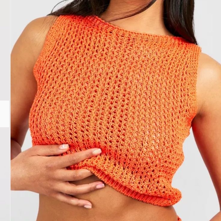 Nwt Boohoo Crochet Orange Top. Came As A Two Piece, But Only Selling The Top. Never Worn, Perfect Condition. With Tags. Originally $55 For Set, Selling Top By Itself For $10. *Smoke-Free Home* Please Note, If Purchasing You Will Only Receive The Top, Not The Skirt. Stretch Knit Crochet Top For Beach, Summer Beach Crop Top In Pointelle Knit, Pointelle Knit Crop Top For Summer Beach, Beach Pointelle Knit Fitted Crop Top, Beach Fitted Pointelle Knit Crop Top, Knit Crop Top For The Beach, Stretch Summer Crochet Top, Trendy Knitted Crochet Top For Beach, Orange Knit Beach Top