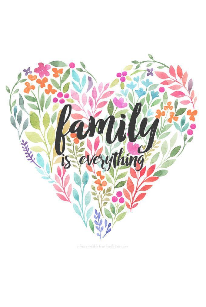 the words family is everything written in a heart shape with flowers and leaves around it