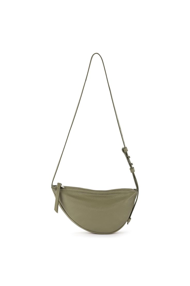 The Tess Sling combines the accessibility of a belt bag with the body-skimming comfort of a crossbody. Kitted with interior pockets and a long adjustable strap, this must-have bag is perfect for anyone who prioritizes straightforward, functional design. 6in L x 2.625in W x 11.5in H; Drop: 20 inches; Weight: 0.62 lb Interior: Repreve Lining Main zipper closure Adjustable Strap Interior contains a back zipper pocket and a slip pocket Adjustable leather sling strap Premium leather from a Leather Wo Walker Shoes, Platform Slippers, Favorite Daughter, Maternity Shops, Unisex Baby Clothes, The Sak, Girls Socks, Kids Sandals, Plastic Bottle