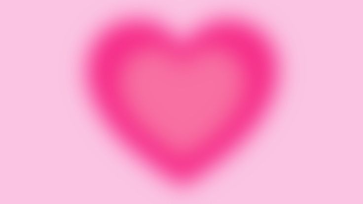 a pink heart on a pink background with the shape of a large heart in the center