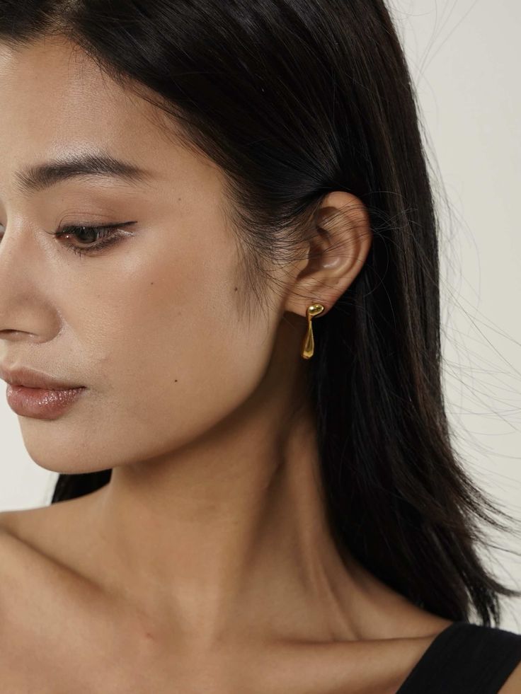 Elevate your style with our Gold Dripping Earrings. These abstract, geometric-inspired pieces make a bold statement, with their irregular form hinting at dripping luxury. Perfect for modern fashionistas or as a unique gift for her. Modern Metal Teardrop Earrings, Modern Metal Teardrop Earrings For Pierced Ears, Minimalist Teardrop Earrings For Party, Modern Metal Drop Hoop Earrings, Sleek Metal Drop Earrings, Modern Metal Teardrop Earrings For Party, Trendy Formal Linear Earrings, Chic Teardrop Earrings Tarnish Resistant, Modern Drop Hoop Earrings