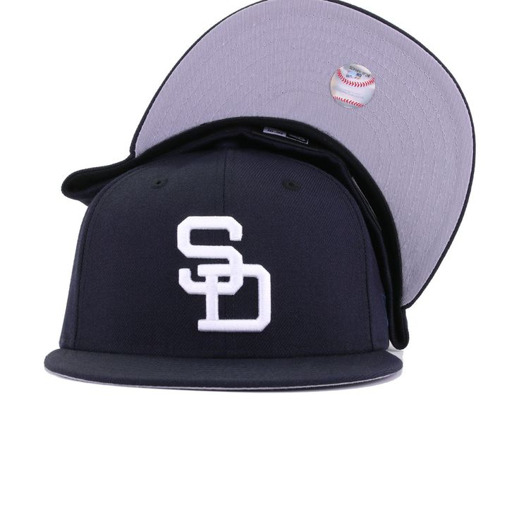 New Era Cap 59Fifty fitted hat for the San Diego Padres in navy blue colorway. Throwback logo gets the colorway from the 90s and 2000s. The result is a super-clean look that is perfect for everyday wear. With bright Snow White logo popping against the dark backdrop of the Navy wool, this is simplicity at its most perfect form. Hat Material: 100% WoolCrown: NavyVisor: NavyButton: NavyUndervisor: GreyFront Logo: Snow WhiteNew Era Flag: Midnight NavyRear Logo: Midnight Navy/Snow White/Light Navy Throwback Snapback Fitted Hat For Baseball Season, Throwback Baseball Cap For Baseball Season, Baseball Season Fitted Hat With Letter Patch, Flat Brim Fitted Hat For Baseball Season, Throwback Baseball Cap For Sports Events, Throwback Fitted Baseball Cap For Sports Events, Navy Fitted Hat With Flat Brim For Baseball Season, Navy Flat Brim Fitted Hat For Baseball Season, Throwback Fitted Hat With Flat Brim For Sports Events