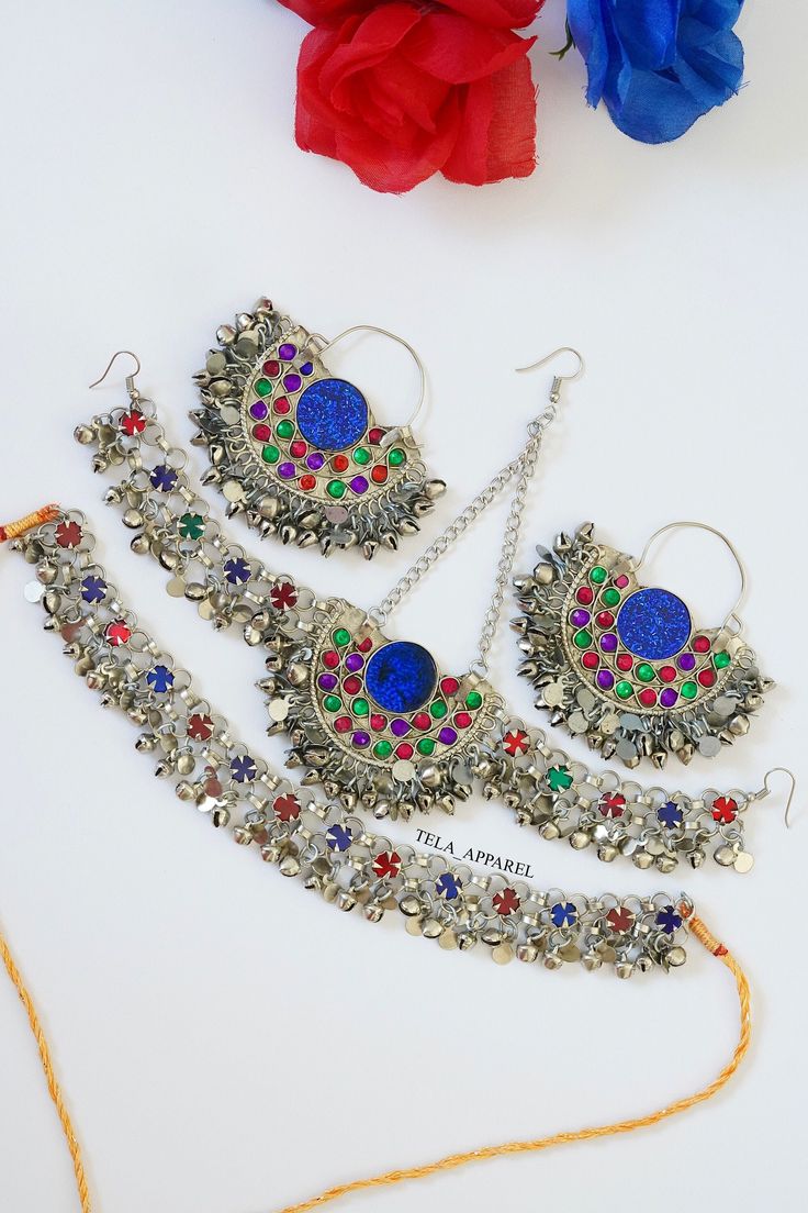 Afghan Jewellery Authentic Traditional Handmade Jewellery. Get in contact with us if there is any queries regarding the item. Check out my page for other items. Help my small business and promote Afghan culture by placing an order with us. We have different kinds and types of Afghan Vintage Jewelleries! Your feedback is much appreciated. Please let us know the item arrived safely! Bohemian Multicolor Metal Jewelry Sets, Bohemian Jewelry Sets With Stone Work For Festivals, Bohemian Kundan Jewelry Sets With Stone Work, Bohemian Silver Earrings With Stone Work, Multicolor Metal Jewelry Sets For Festivals, Handmade Bollywood Jewelry Sets For Festivals, Silver Jewelry Sets With Mirror Work For Festivals, Bollywood Style Handmade Jewelry Sets For Festivals, Bohemian Kundan Jewelry Gift