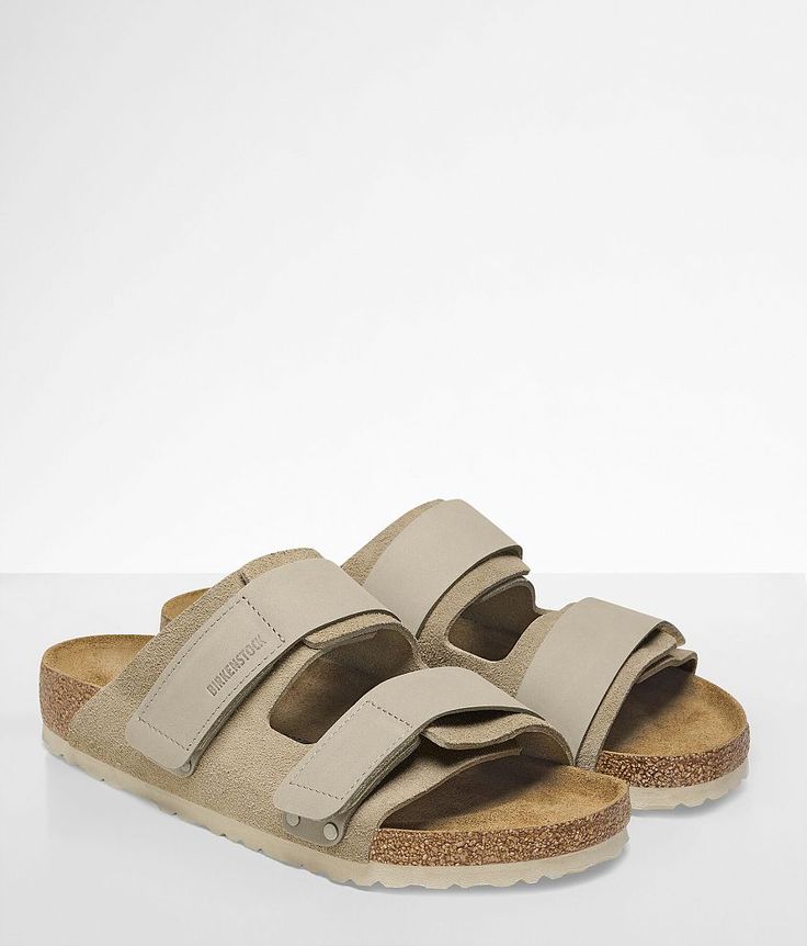 Birkenstock® Uji Suede Sandal - Brown US 11, Women's Taupe Double nubuck leather hook and latch strap sandal Contoured cork-latex suede lined footbed Flexible EVA sole. Due to the nature of leather/suede, small variances of color in the skin may occur, this is in no way considered a defect. These are inherent characteristics of leather/suede and will enhance the individual look of your garment.. Upper: Suede/Nubuck Leather. EVA sole.. WOMEN'S BIRKENSTOCK CONVERSION CHART U.S. Size Birkenstock Si Double Strap Footbed Sandals With Textured Footbed For Outdoor, Outdoor Double Strap Sandals With Textured Footbed, Outdoor Double Strap Footbed Sandals With Textured Footbed, Beige Closed Toe Sandals With Cork-bed Midsoles, Suede Sandals With Leather Footbed For Outdoor, Outdoor Suede Sandals With Leather Footbed, Outdoor Suede Sandals With Textured Footbed, Comfortable Suede Double Strap Footbed Sandals, Casual Double Strap Sandals With Cork-bed Midsoles