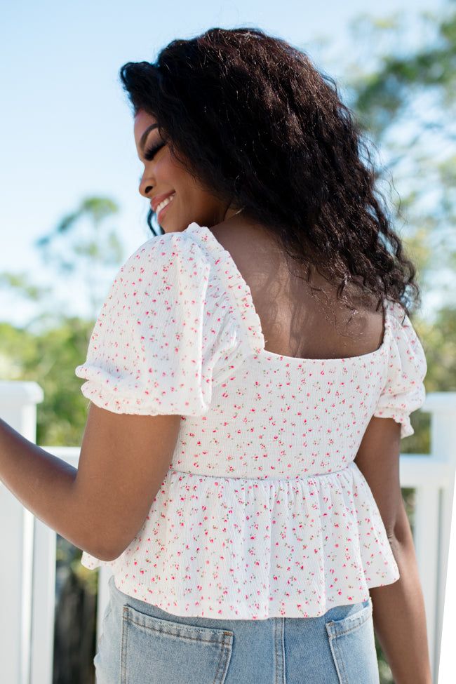 Details Ivory and Pink Floral Cinched Bust Knit Top Fabric is very stretchy Cinched bust, decorative tie on bust, elastic in sleeves and bust Pair this top with a cute pair of jean shorts! Unlined Size small from shoulder to hem: 16" Material and Care 62% cotton 33% polyester 5% spandex Hand wash cold, no drum drying Patterns may vary Materials may have natural variations Colors may vary from different viewing devices Casual Puff Sleeve Top With Square Neck, Cute Tops With Smocked Back For Day Out, Fitted Puff Sleeve Top With Tie Back, Casual Square Neck Top With Tie Back, Casual Puff Sleeve Top With Smocked Back For Spring, Casual Puff Sleeve Top With Smocked Back For Summer, Casual Puff Sleeve Top With Smocked Back, Fitted Smocked Top With Gathered Sleeves For Day Out, Fitted Smocked Top With Square Neck For Day Out