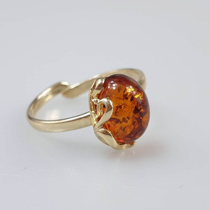 Gemstone Ring, Small Crystal Ring, Adjustable Gold Ring, Baltic Amber, minimalistic rings, amber ring, handmade jewelry. Very small and cute ring - 1 cm. Adjustable size. All parts gold plated sterling silver 925. Handmade Minimalist Adjustable Birthstone Ring, Handmade Adjustable Minimalist Birthstone Ring, Adjustable Amber Open Ring Jewelry, Amber Gemstone Rings For Jewelry Making, Handmade Adjustable Citrine Rings, Orange Open Ring Jewelry As Gift, Orange Open Ring Jewelry For Gift, Minimalist Brown Rings For Gifts, Adjustable Gold Citrine Rings