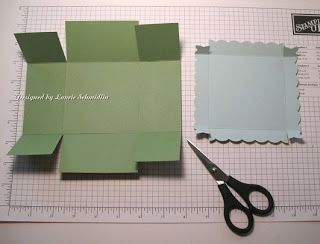 cut out pieces of paper and scissors on top of a piece of paper that has been cut into rectangles