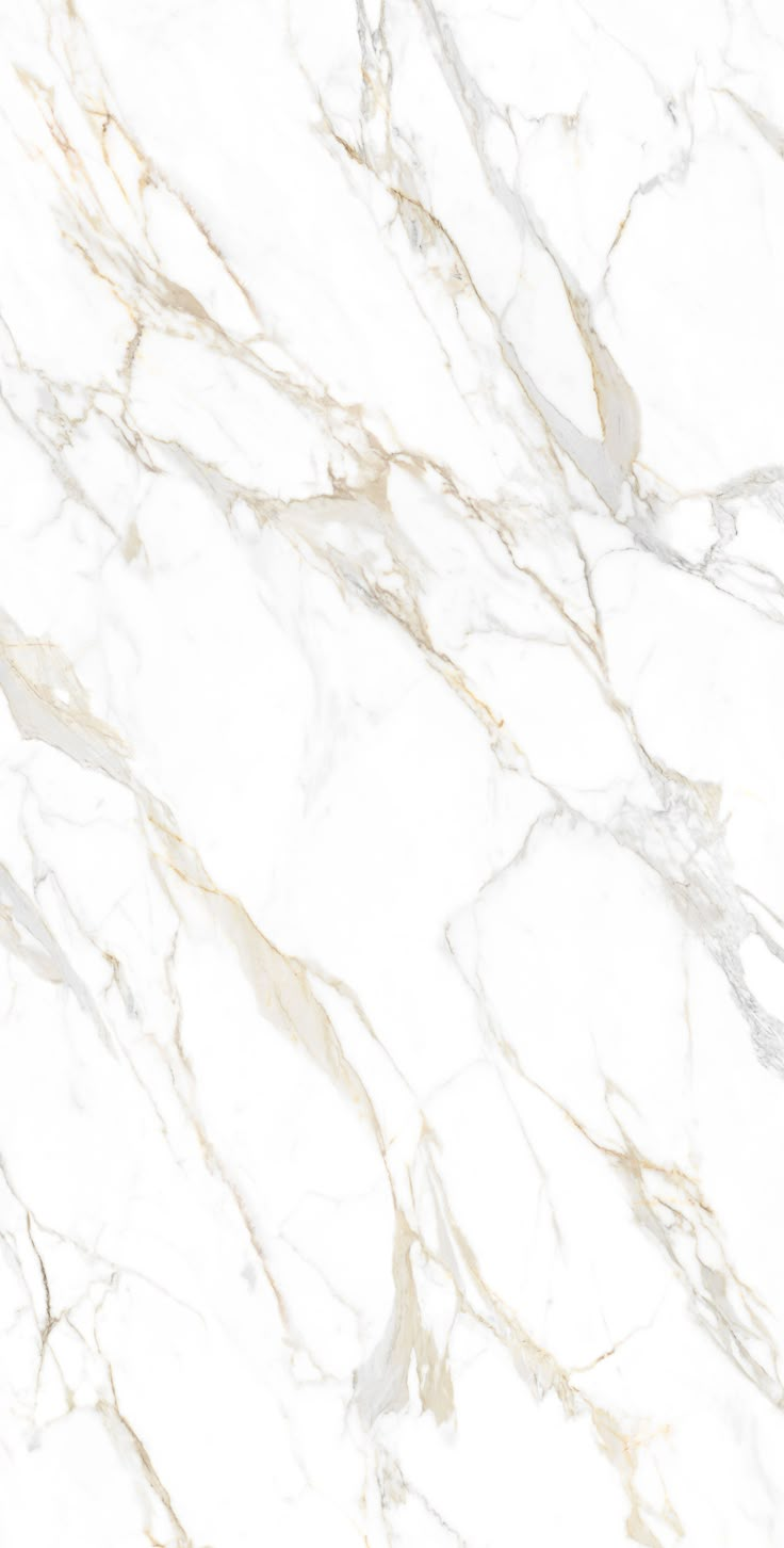 a white marble textured surface with gold veining