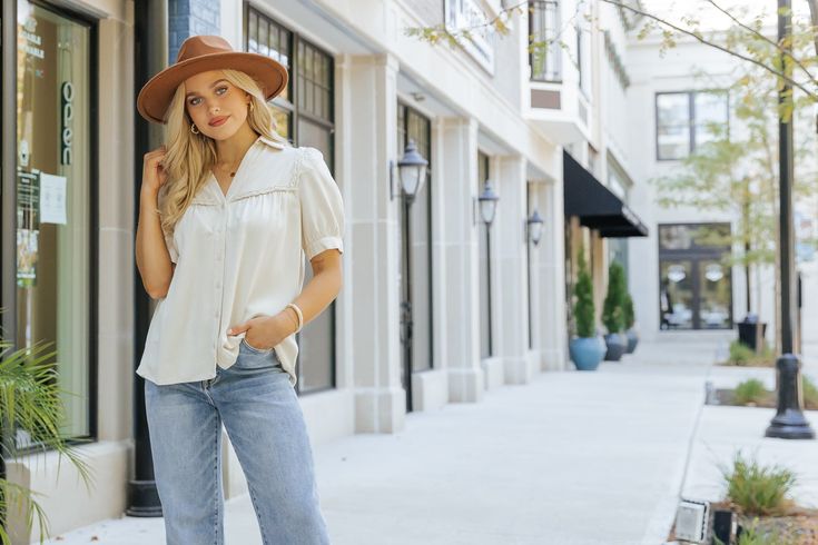 Add a touch of texture and elegance to your everyday wardrobe with the Braided Button Down Top! This effortlessly chic top blends classic design with unique boho-inspired details, making it a versatile must-have. Featuring intricate braided trim detail, this top elevates a simple look with subtle, eye-catching texture. Whether paired with jeans, skirts, or layered under a jacket, this top is the perfect blend of casual and boho chic, making it a go-to piece for any occasion. Versatile Spring Blouse With Button Closure, Casual Blouse With Boho Collar For Spring, Casual Fall Blouse With Buttons, Classic Fall Blouse For Casual Gatherings, Spring Bohemian Tops For Casual Gatherings, Bohemian Tops For Casual Gatherings In Spring, Bohemian Tops For Spring Casual Gatherings, Chic Rayon Blouse With Button Closure, Spring Blouse For Casual Gatherings With Button Closure