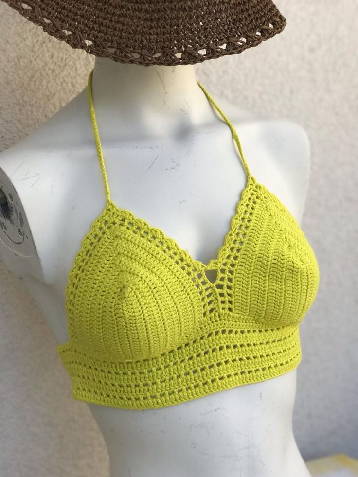 S Size  Elevate your beach style with our stunning Green Halterneck and Body-tie Bustier and Bikini Top, designed as a unique color match for bronze skin, creating a mesmerizing and radiant look. 🌞💚 🏖️✨ The halterneck design provides a comfortable and flattering fit, while the body-tie detail adds a touch of elegance and playfulness to your beachwear. 🏝️🎀  🌊💕 Make a bold fashion statement with this eye-catching piece, perfect for lounging poolside or strolling along sandy shores. ️🌴 🛍️😍🌅 Summer Festival V-neck Halter Top, Summer V-neck Beach Crop Top, Tropical Halter Neck Top For Summer, Tropical Summer Halter Neck Top, Green Tropical Halter Top For Summer, Tropical Green Halter Top For Summer, Green V-neck Halter Top For Vacation, Tropical Halter Top For Beach Vacation, Adjustable Summer Swimwear