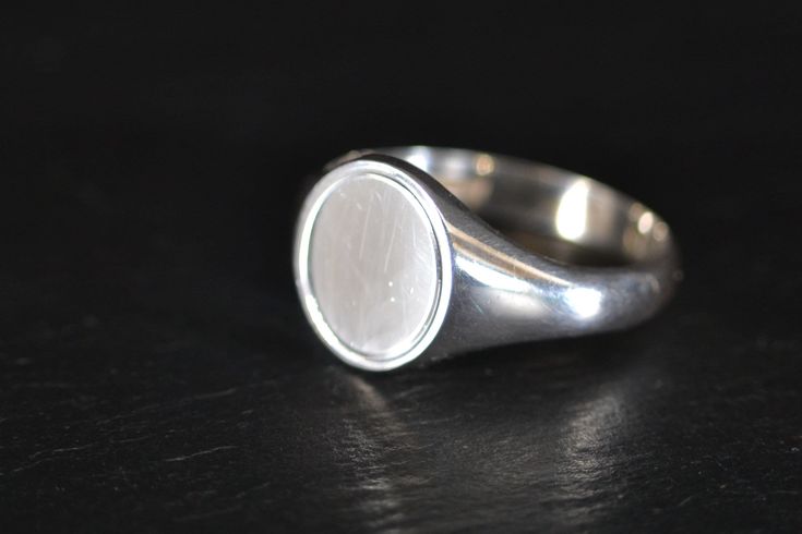 "These superb vintage sterling silver signet rings are by the renowned English Jeweller Henry Griffith & Sons (1850-1982). HG&S started to wind down in the 1970s and sadly finally closed their doors in 1982. They are part of a collection of new old stock signet rings I acquired recently. This particular style signet ring has a \"D\" shape band with an oval face. I have indicated they are from the 1970s but I believe they could be earlier. Ring sizes: Sizes available UK size U = about US 10 and 1 Classic Hallmarked Signet Ring Collectible, Classic Hallmarked Signet Ring For Collectors, Classic Oval Signet Ring Collectible, Classic Round Signet Ring Collectible, Classic Collectible Rings With Polished Finish, Classic Round Signet Ring For Collectors, Classic White Gold Signet Ring Collectible, Classic Collectible Signet Ring, Classic Collectible Signet Ring With Engraving