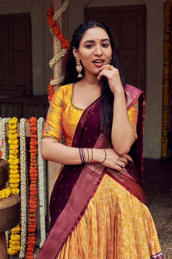 Traditional Half Saree – Fusion of Tradition and Contemporary Style | Pattu Half Saree | Size 36 | langa voni| teens| half saree women Step into the world of timeless elegance with Traditional Half Saree, a perfect fusion of tradition and contemporary flair. This exquisite ensemble is designed to capture the latest trends in Pattu Half Sarees, making it an ideal choice for weddings, festivals, and special occasions. Crafted with love and care, this saree reflects the intricate craftsmanship of M Navratri Bollywood Style Blouse With Tilla Details, Bollywood Style Blouse Piece With Tilla For Festivals, Festive Anarkali Pre-draped Saree With Tilla Detailing, Festive Anarkali Pre-draped Saree With Tilla, Navratri Semi-stitched Saree With Tilla Details, Navratri Semi-stitched Tilla Saree, Bollywood Style Pre-draped Saree With Tilla For Festivals, Transitional Self-design Lehenga For Puja, Festive Yellow Traditional Wear With Tilla