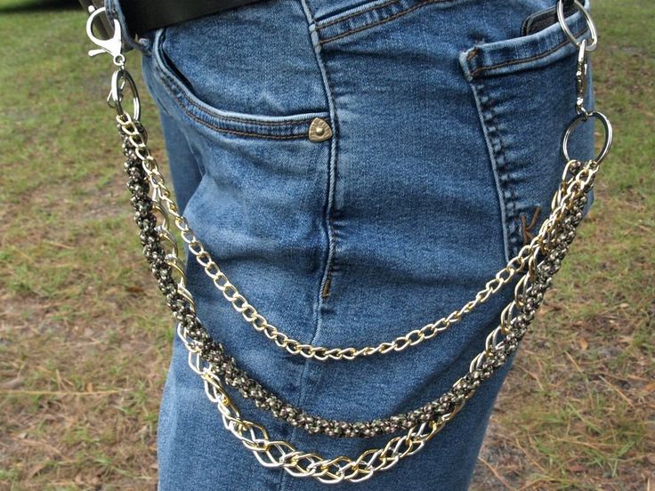 Gold hardware with silver and gold chains. The 325 paracord is multi colored with green, burgundy, and tan. Chain Pants, Jeans Chain, Wallet Chains, Pant Chains, Biker Denim, Unique Wallets, Punk Rocker, Biker Jeans, Mode Masculine