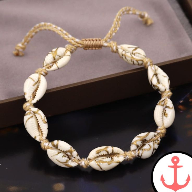 Enhance Your Nautical Style with the Cowrie Shell Bracelet Are you a passionate lover of the sea? Do you find joy in adorning yourself with nautical-inspired jewelry? If so, then our Cowrie Shell Bracelet is the perfect accessory for you. Made from beautiful shells, this adjustable bracelet captures the essence of the ocean and its wonders. Click here to explore our Shell Bracelet collection and find the perfect piece to complement your style. Features of the Cowrie Shell Bracelet based on Produ Cowrie Shell Bracelet, Beautiful Shells, Anklets Boho, Beach Anklets, Women Anklets, Boho Handmade, Stylish Bracelet, Shell Bracelet, Nautical Fashion