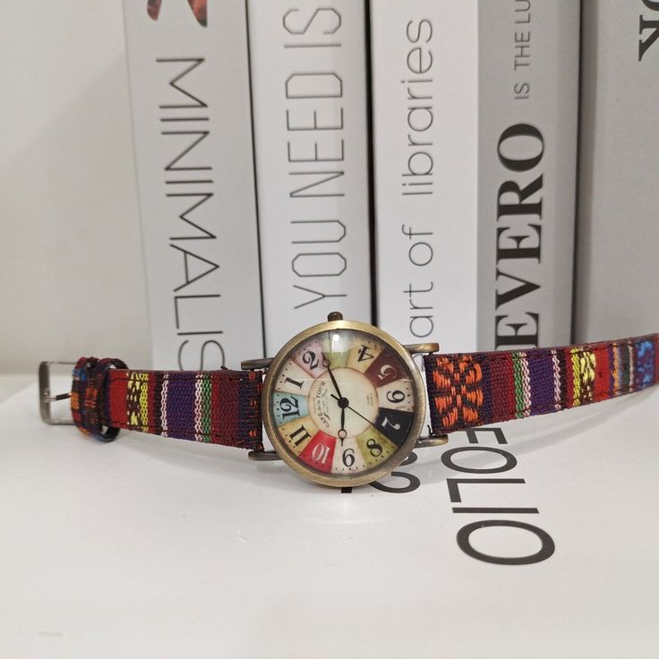 💯Secure Payments Via PayPal® and CreditCard 🎁Beautifully packaged 🎉More than 95% of customers recommend this product. 🎁87.6% Reviewers Recommends Buy 2 Or More. ⌚✨A Fusion of Timeless Elegance and British Eccentricity! 🌈🎩Elevate your wrist game with our uniquely crafted Boho Hippie Steampunk Watch, where the charm of Bohemian spirit meets the sophistication of Victorian-inspired steampunk. 🌟 Boho Chic Revival: Embrace the carefree, artistic vibe of Boho fashion with our intricately designed watch. A canvas of colors and patterns that resonate with the free spirit within. 🌺🍃 ⚙️ Steampunk Sophistication: Transport yourself to the golden era of innovation and industrial charm. The Steampunk influence in our watch adds a touch of British eccentricity and a nod to the Victorian age. 🔍 Copper Fabric, Victorian Age, Purple Tone, Steampunk Watch, Red Tone, Central African, Modern Pendant Light, Congo Kinshasa, Modern Pendant