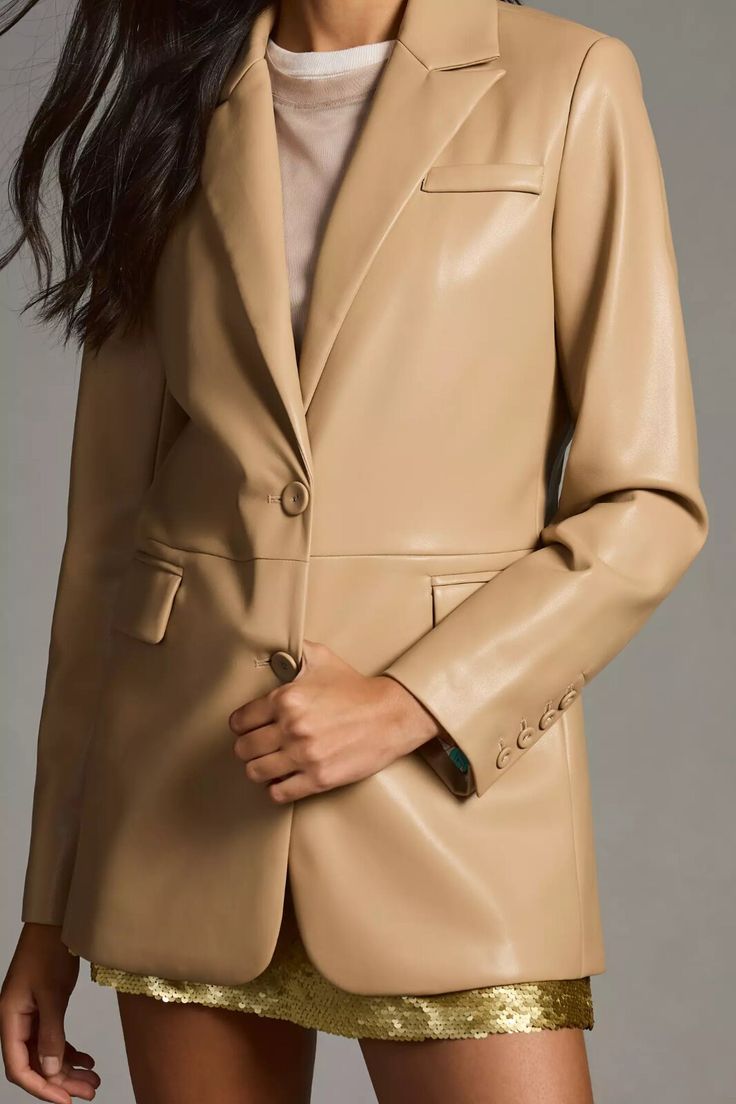 Leather Blazer for Women Tan Pure Lambskin, Women in long sleeve leather jacket | blazer dress wedding | Gift For Her | Material: Lambskin Leather Inner: Soft Viscose Lining Front: Button Closure Collar: Notch Lapel Collar Sleeves: Long Sleeves Cuffs: Open Hem Cuffs Pockets: 2 Front Pockets And One Inside Color: Tan High Quality Leather: We use only the finest materials in the market. The leather is our passion. We source the best leather skins and use traditional methods to produce batches of t Fitted Faux Leather Classic Blazer, Fitted Faux Leather Blazer With Notch Lapel, Fitted Classic Faux Leather Blazer, Faux Leather Business Jacket, Leather Blazer With Hidden Button Closure, Beige Leather Blazer For Office, Leather Blazer With Hidden Button Closure And Long Sleeves, Winter Formal Faux Leather Blazer, Sleek Brown Blazer For Fall