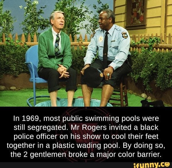 two men sitting in chairs talking to each other on the television show mister rogers once used an egg timer and simply let it run for sixty seconds