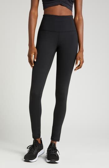 The moisture-wicking tech of stretchy, brushed Zeltek fabric keeps you cool as your workout warms up in these leggings topped with a high, slip-free waistband. 29" inseam; 8 1/2" leg opening;  (size Medium) Elastic waistband with hidden pocket Brushed, moisture-wicking fabric dries quickly to keep you cool and comfortable Smooth flatlock seaming designed to eliminate rubbing and irritation 88% polyester, 12% spandex Machine wash, tumble dry Imported Moisture-wicking Compression Activewear With 5-inch Inseam, Sporty Stretch Activewear With 5-inch Inseam, Black Yoga Pants With 5-inch Inseam For Gym, Black 4-way Stretch Leggings For Sports, Black Tight Activewear With 5-inch Inseam, Sporty Breathable Leggings In Recycled Polyester, Compression Athleisure Leggings With 5-inch Inseam, Recycled Polyester Full Length Leggings For Workout, Recycled Polyester Full-length Leggings For Workout