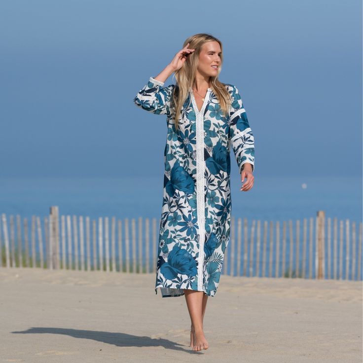 Who doesn’t love a beautiful caftan? Ours is a natural choice to pack for a beachy vacation or pool party. The beautiful and breathable cotton fabric looks like linen and is the perfect combination of lightweight, soft and aesthetically flattering. Special features include lace trim decorating the front and sleeves, v neck and split hem. 100% cotton. Product Overview: Special features: lace trim decorating the front and sleeves, v neck and split hem Material: 100% cotton Model is 5’8 and wearing