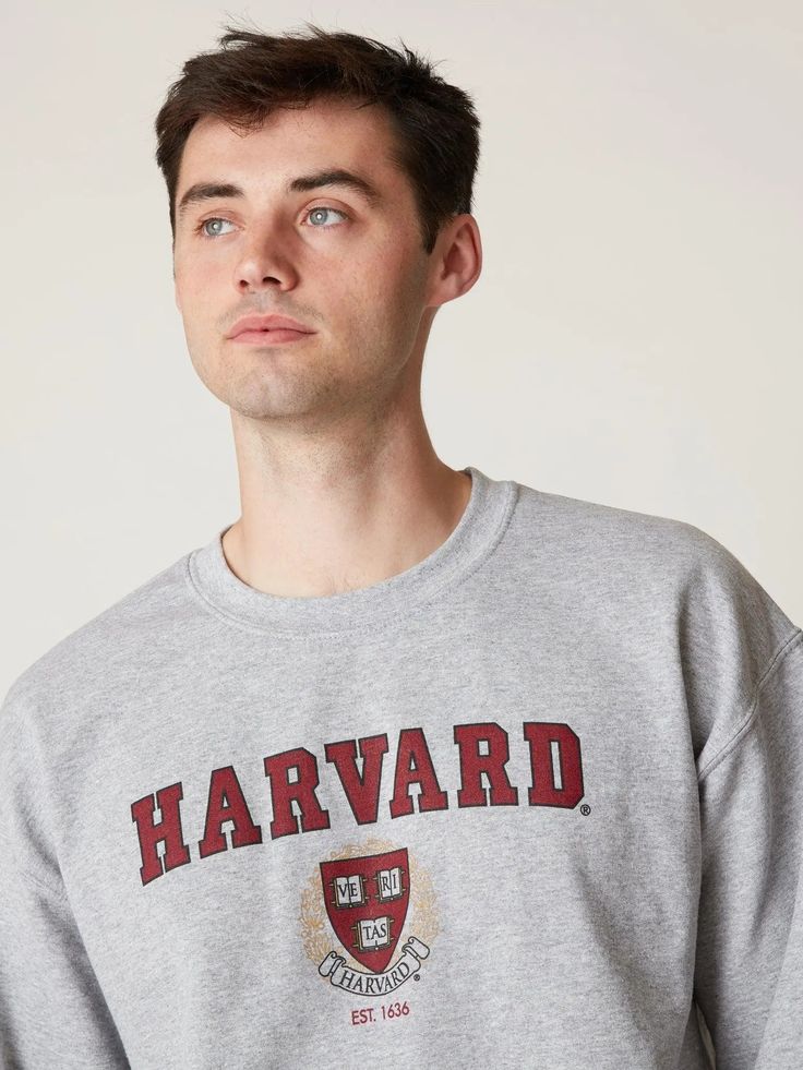 Stay stylish and warm with our Harvard crewneck! A classic but comfortable look, you'll be ready to go anywhere with this piece of Harvard apparel. This Crewneck is a favorite among our students and their families. Ultra-soft & lightweight fabric Crew neckline with classic trim at neck, cuffs & hem Unisex design Official Licensed Harvard University Merchandise All products are designed, packaged, and shipped by Harvard University students Looking for more? Shop more bestseller styles. Crew Neck T-shirt With University Logo For Fall, Collegiate Crew Neck Top For Campus, Gray Sweatshirt For Campus In Fall, Gray Winter Sweatshirt For Campus, Gray Sweatshirt For Fall Campus, Gray Fall Sweatshirt For Campus, Varsity Style Relaxed Fit T-shirt For Fall, Varsity Style T-shirt With Relaxed Fit For Fall, Gray Letter Print Sweatshirt For Campus