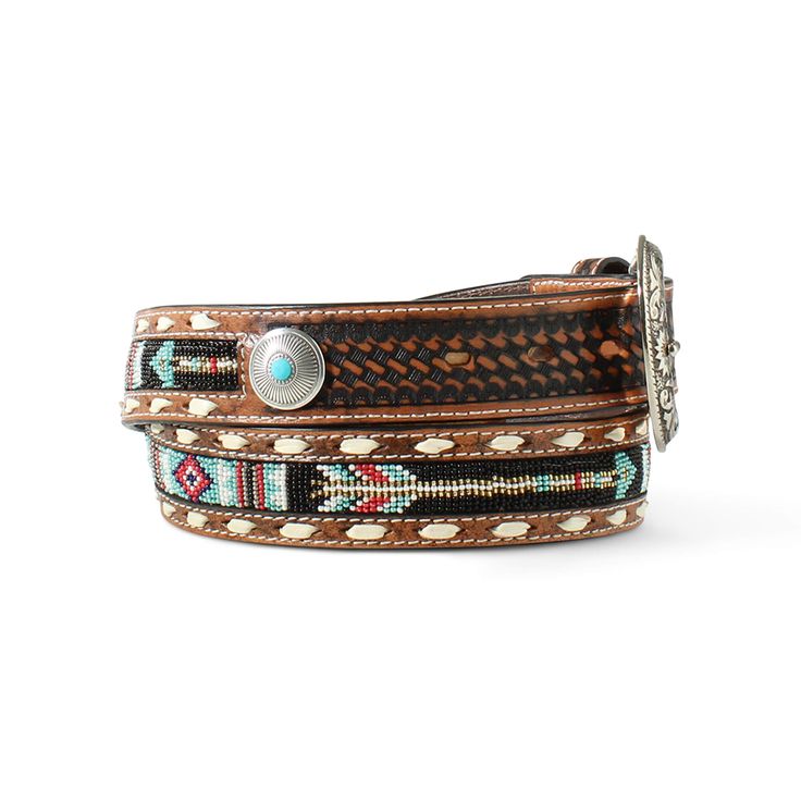 Suited to a bold and modern cowboy, this genuine leather belt features a colorful beaded inlay, antique silver and turquoise concho, and a floral silver buckle. A dynamic addition to any pair of jeans. Southwest Beaded Belt | Product Features : 0 : 1 1/2\ wide strap | Men's Southwest Beaded Belt in Beige Khaki Leather, Size: 36 by Ariat Artisan Belts With Concho And Adjustable Fit, Western Leather Belts For Festivals, Western Style Leather Belts For Festivals, Adjustable Hand Tooled Belt For Festivals, Southwestern Style Leather Belt For Rodeo, Adjustable Western Belts For Festivals, Western Adjustable Belts For Festivals, Western Style Adjustable Belts For Festivals, Southwestern Style Concho Belt For Festivals