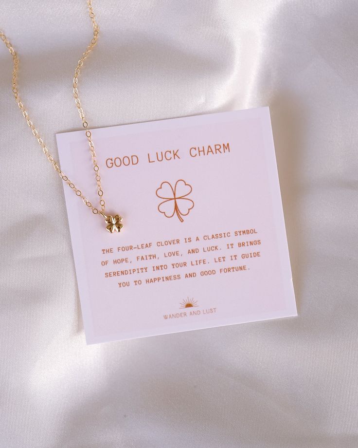 Bring luck to your life with this dainty Four Leaf Clover Luck Necklace! Power up your good fortune with the unique charm of this whimsical necklace! The four-leaf clover is a classic symbol of hope, faith, love and luck. It brings serendipity into your life. Let it guide you to happiness and good fortune. NECKLACE FEATURES Chain: 14K Gold-filled Cable Chain Charm: 9x6mm Brass, 18K Gold-plated with cubic zirconia Each necklace comes with a "Good Luck Charm" card Dainty Delicate Chain Jewelry For Good Luck, Dainty Round Pendant Charm Necklace For Good Luck, Meaningful Charm Necklaces As Gifts, Meaningful Charms Necklace Gift, Meaningful Charm Necklace For Gifts, Dainty Delicate Chain Necklace For Good Luck, Dainty Flower Charm Necklace As Gift, Dainty Flower Charm Necklace For Birthday Gift, Dainty Flower Charm Necklace For Gift