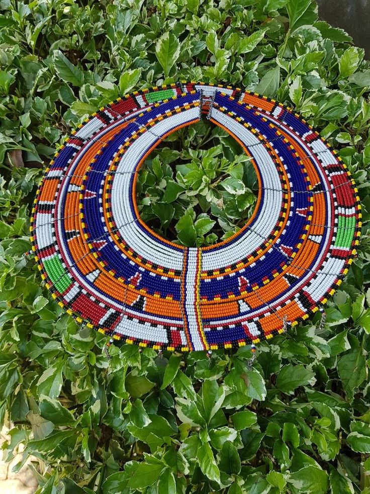 Maasai wedding necklace handcrafted using colorful fine beads and beading wires. Perfect for weddings, cultural events, African themed events, the list is endless... More neckleces here; https://www.etsy.com/shop/TribalTess?ref=seller-platform-mcnav&section_id=21306083 Back to my shop; https://www.etsy.com/shop/TribalTess?ref=seller-platform-mcnav Bohemian Handmade Beaded Necklaces For Traditional Ceremonies, Necklace With Colorful Round Beads For Traditional Ceremonies, Bohemian Colorful Beads For Wedding, Artisan Beaded Necklaces For Traditional Ceremonies, Multicolor Beaded Necklaces For Traditional Ceremonies, White Round Beads Necklaces For Traditional Ceremonies, Bohemian Beaded Necklace With Round Beads For Wedding, Bohemian Tiny Beads For Wedding, White Round Bead Necklaces For Traditional Ceremonies