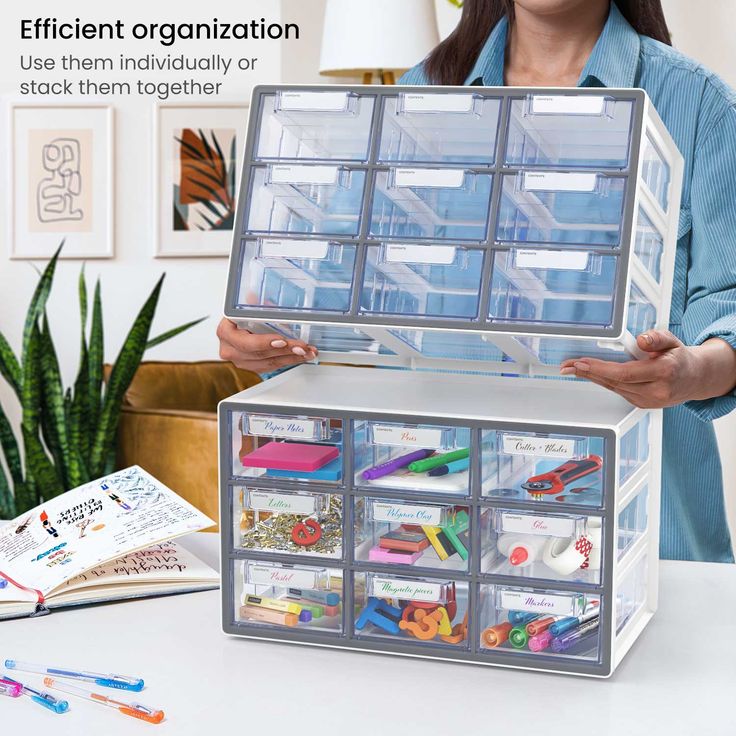 a woman is holding up a plastic storage box with compartments on the top and bottom