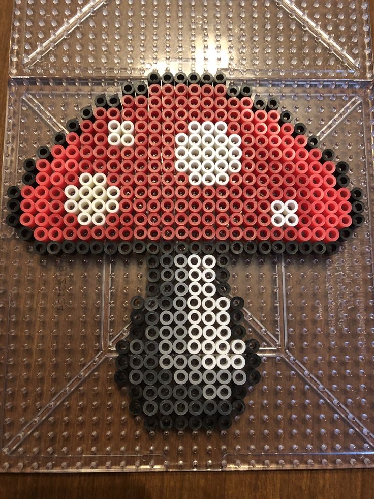 an image of a mushroom made out of perler beads