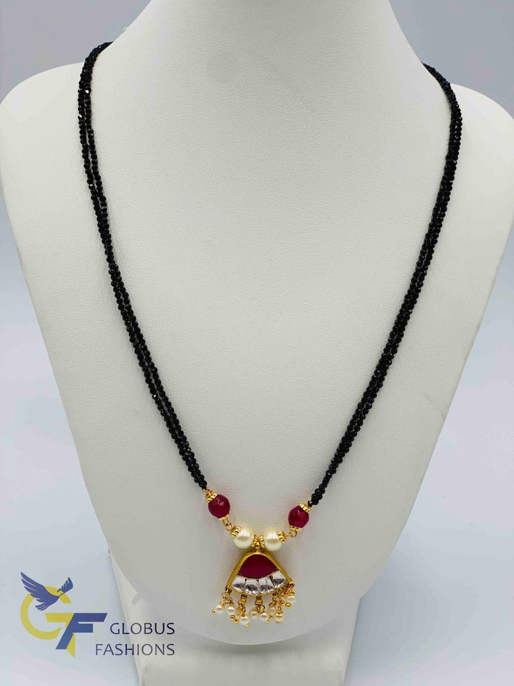 Traditional kundan and ruby stones with pearls pendant with black diamond beads chain Handmade jewelry Silver-plated jewelry One gram gold jewelry For more products please visit Globusfashions.com Official Website globusfashions.com 🌸 S H O P . M O R E . S T Y L E S 🌸 https://www.etsy.com/shop/Globusfashions Necklaces - https://www.etsy.com/shop/Globusfashions?section_id=18712263 Bracelets - https://www.etsy.com/shop/Globusfashions?section_id=18969767 Pendant Sets - https://www.etsy.com/shop/G Cheap Black Beads With Dangling Details, Black Beads Chain, Black Diamond Beads, Jumka Earrings, Black Beads Mangalsutra, Pendant Sets, Black Beaded Jewelry, Wedding Jewellery Collection, Beads Chain