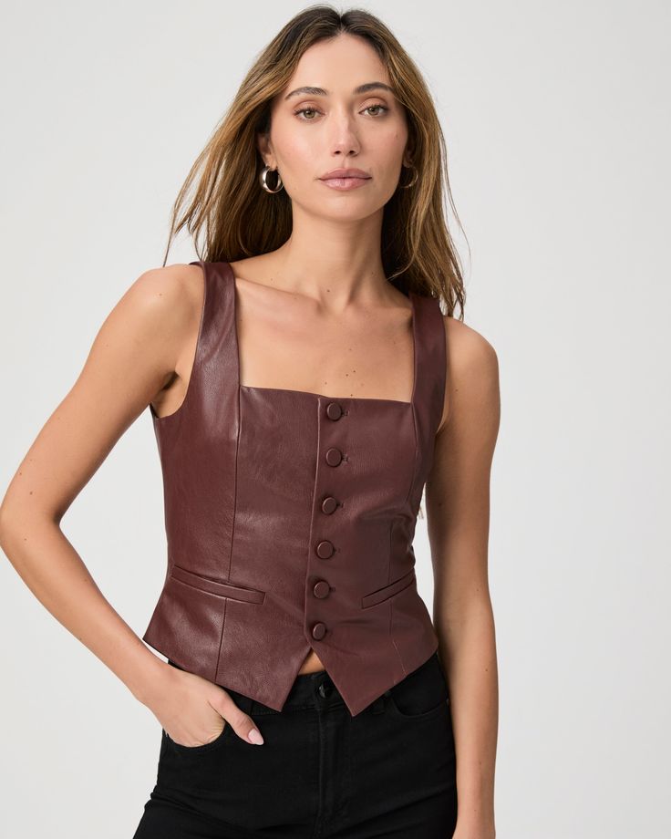 Crafted from our soft stretch faux leather, this sleeveless dark brown vest top is fitted throughout the body with front princess seams, a square neckline, a front notch, and welt pockets. | Irene Vest Top - Rum Raisin Faux Leather | Size 10 Fitted Faux Leather Top For Work, Fitted Faux Leather Tops For Work, Fitted Vest For Fall, Chic Brown Tank Top For Fall, Chic Fitted Faux Leather Tops, Sleeveless Leather Top For Night Out, Chic Fitted Leather Vest, Fitted Vest For Night Out In Fall, Sleeveless Faux Leather Top For Night Out