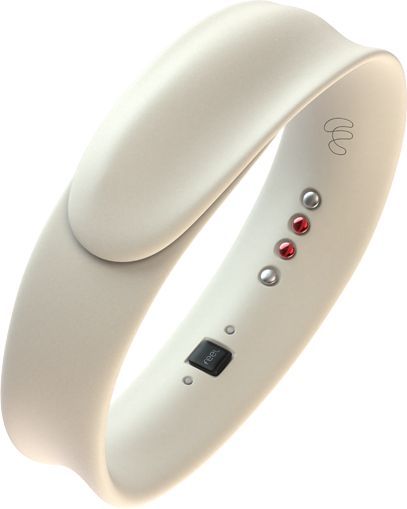 a white bracelet with red stones on the side and an electronic device attached to it