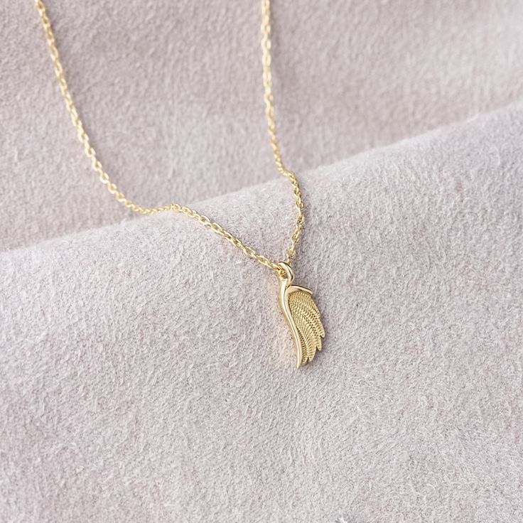 "Gold Angel Wing, Gold Angel Pendant, Engraved Angel Wing Charm, Mom Angel Wing Necklace, Gold Wing Necklace, Angel Wing Charm All of our products has the stamp \"585\" on them. (which states that this is real gold) Gold lock necklace 1.39 gr and the chain length is 42 cm. There may be +/- 0.15 change in gram information due to production. Your products will be shipped with free shipping UPS express within 1-3 business days. Quality control has been done. Gold lock pendant is Anti Allergic. Your Gold Wing-shaped Sterling Silver Necklace, Engraved Wing-shaped Jewelry For Gifts, Engraved Wing-shaped Jewelry Gift, Yellow Gold Wing-shaped Necklace For Gift, Personalized Wing-shaped Necklaces For Gifts, Personalized Wing-shaped Necklace For Gift, Mom Angel, Elegant Gold Necklace, Evil Eye Necklace Gold