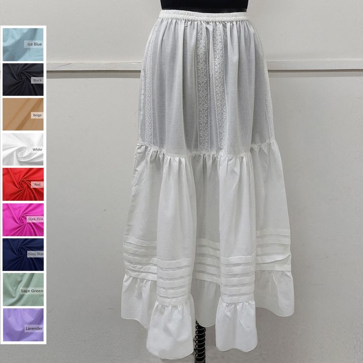 Discover the timeless allure of the cotton ruffle half slip. Crafted from high-quality cotton, it offers comfort and elegance. Perfect for a seamless silhouette, it adds a layer of modesty to skirts and dresses. Embrace classic style with this versatile wardrobe essential. Cotton Underskirt / Cotton Petticoat / Cotton Half Slip / Cotton Dress Liner ➡️Sale for 1 Half Slip (lace color remains white). ➡️100 % Light Weight Cotton.. ➡️Care: Hand wash in cold water. Do not bleach.  ➡️Available sizes : (Measurements are of garment only) X-SMALL- Fits US Size 0-2 (Elastic waistband 21.5" inch relax to 24.5" inch stretched, Hip 35" inch). SMALL- Fits US Size 2-4 (Elastic waistband 23" inch relax to 27" inch stretched, Hip 38" inch). MEDIUM- Fits US Size 6-8 (Elastic waistband 27" inch relax to 32" Fitted Peasant Skirt With Ruffles, Daywear Tiered Gathered Petticoat, Peasant Cotton Skirt With Ruffles, White Regency Style Petticoat With Ruffles, Daywear Ruffled Tiered Skirt Petticoat, Daywear Tiered Skirt Petticoat With Ruffles, Daywear Tiered Petticoat With Ruffles, Cotton Petticoat With Gathered Skirt For Daywear, White Cotton Skirt With Attached Cancan