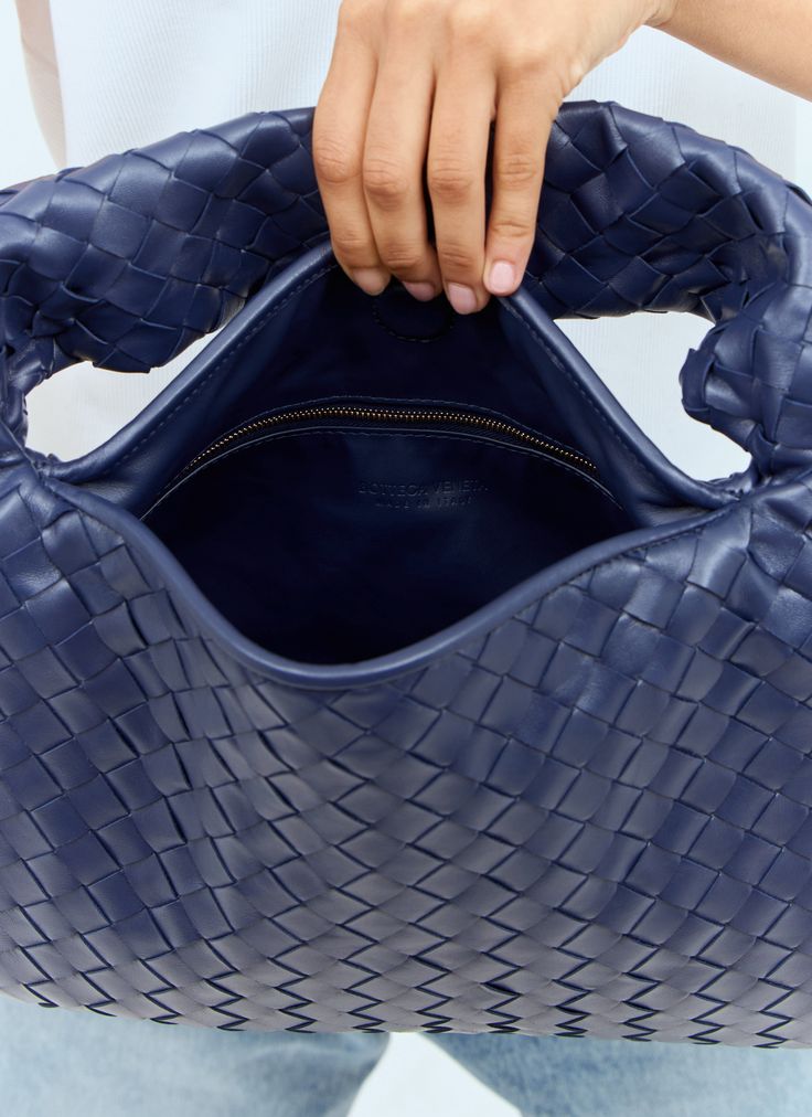 Small Hop shoulder bag in Intrecciato woven leather. Top handle Interior magnetic fastening Intrecciato weave One main compartment Interior zip pocket Made in Italy 100% Leather Color: Navy Code: 796262 V3IV1 4527 SKU: bov0257060blu Our Products Are 100% Genuine. In All Cases We Stand By The Authenticity Of Every Product Sold On Our Site. Blue Bags, Leather Top, Bottega Veneta, Top Handle, Zip Pockets, Burberry, Fendi, Dior, In Italy