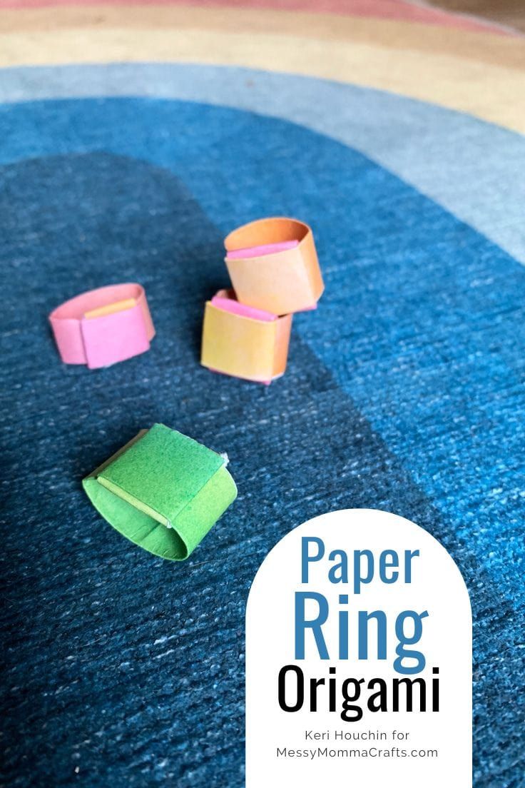 paper ring origami sitting on top of a blue rug