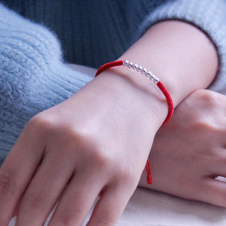 🍀 100% handmade 🍀 Materials ：4mm 925silver & string 🍀 personalized：【yes 】➜Please feel free to contact me. 🍀 colors：Black & Red【other colors are available】➜ Just give messages and tell me which color do you like. 🍀 length：【length is adjustable and can be made as you want】➜You can just tell me what is the perfect length you like. 🍀 processing time： 1-2 workdays all my products are here: https://www.etsy.com/shop/JoanaAbby?ref=seller-platform-mcnav Sterling Silver Braided Bracelet Gift, Sterling Silver Braided Round Bracelet Gift, Spiritual Sterling Silver Braided Bracelet Gift, Sterling Silver Round Braided Bracelet, Handmade Silver Braided Bracelet Gift, White Gold Sterling Silver Braided Bracelet For Gifts, White Gold Sterling Silver Braided Bracelet As Gift, Silver Beaded Friendship Bracelet, Personalized Silver Braided Bracelet Minimalist Style