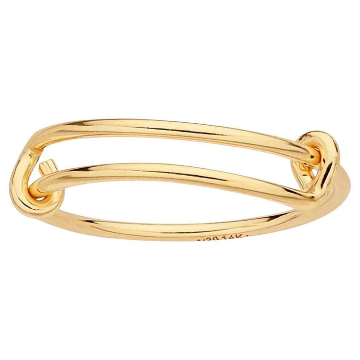 This expandable 14/20 yellow gold-filled brass wire ring features two hook ends that loop around the shank, allowing the ends to slide freely and adjust the ring from size 6 to 8 for a comfortable fit. The tight loops at each end ensure charms stay securely in place while still moving freely within the center section. The ring is adjustable. (size 6-8) Attributes: Metal Type: Gold-filled Karat: 14/20 Metal Color: Yellow Ring Type: Fashion Ring Style: Adjustable Band Shank Width: 1mm Features & Maintenance: • All gold-filled rings are fabricated and may have visible solder joints. Twisted Wire Rings, Yellow Ring, Faceted Ring, Yellow Rings, Wire Ring, Chevron Ring, Pattern Ring, Wrap Ring, Knuckle Rings