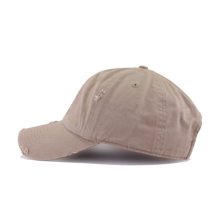 a baseball cap with holes on the front and side, sitting against a white background